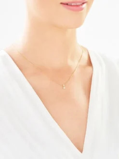 Zawieszka z żółtego i białego złota z brylantem - 0,02 ct - próba 585