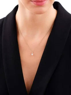 Zawieszka z żółtego i białego złota z brylantem - serca - 0,10 ct - próba 585