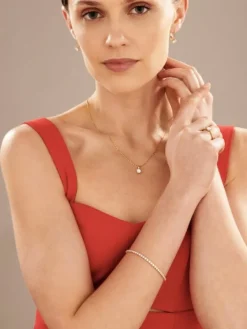 Zawieszka z żółtego i białego złota z brylantem - SI2/H - 0,50 ct - próba 585