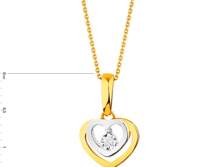 Zawieszka z żółtego i białego złota z brylantem - serce - 0,01 ct - próba 375