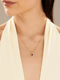 Zawieszka z żółtego i białego złota z brylantami i rubinem - próba 585