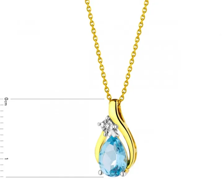 Zawieszka z żółtego i białego złota z diamentem i topazem - próba 375