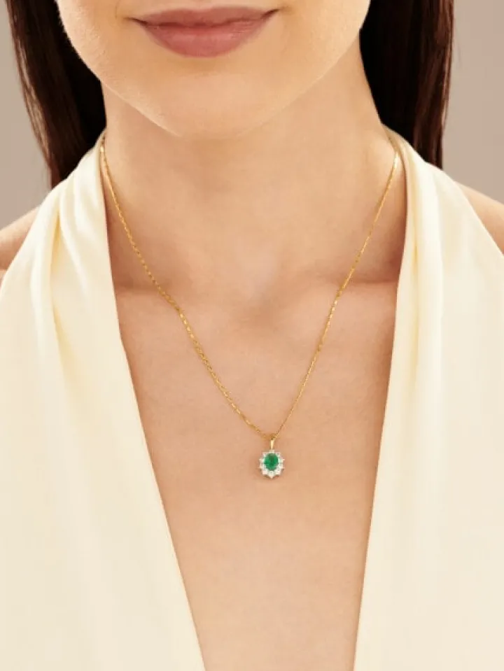 Zawieszka z żółtego i białego złota z brylantami i szmaragdem - próba 585