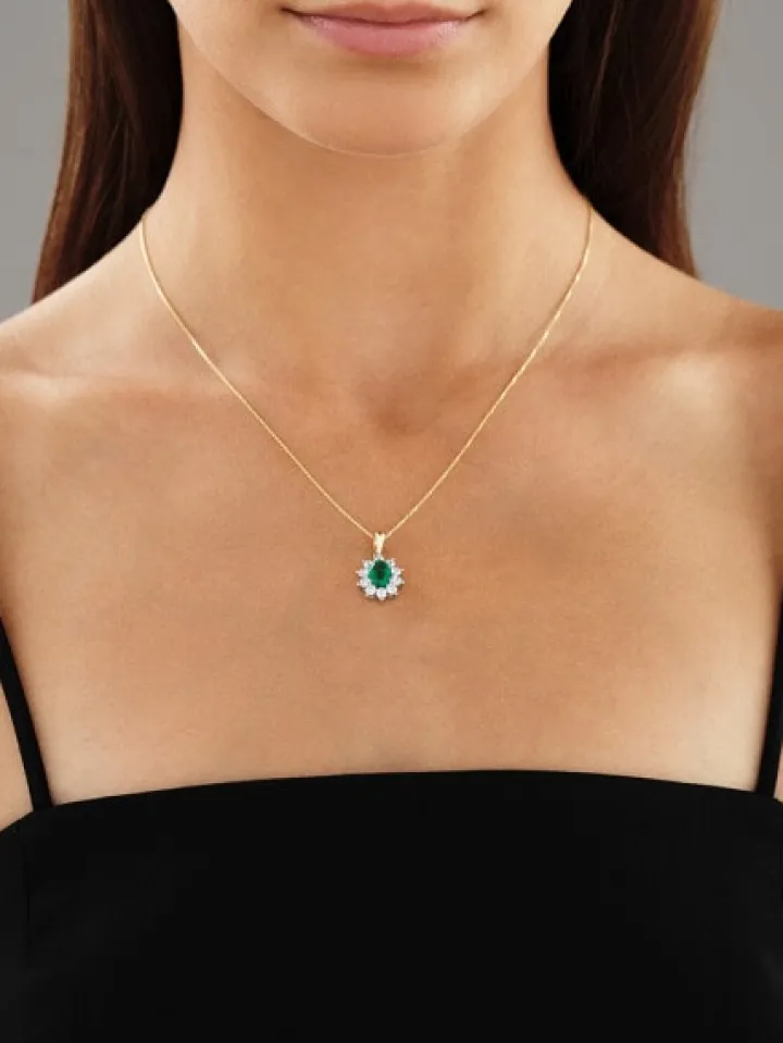 Zawieszka z żółtego i białego złota z brylantami i szmaragdem - próba 585