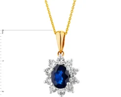 Zawieszka z żółtego i białego złota z brylantami i szafirem - próba 585