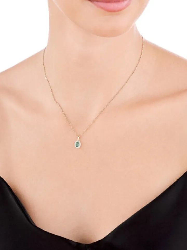 Zawieszka z żółtego złota diamentami i szmaragdem - próba 585