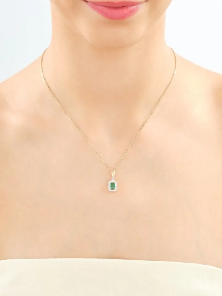 Zawieszka z żółtego złota z brylantami i szmaragdem - próba 585