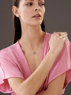 Zawieszka z żółtego złota z brylantami i rubinem - próba 585