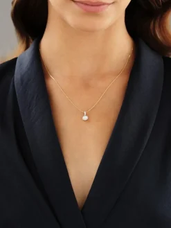 Zawieszka z żółtego złota z brylantami - 0,45 ct - próba 585