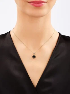 Zawieszka z żółtego złota z czarnymi brylantami i onyksem - próba 585