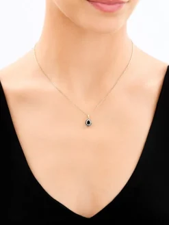 Zawieszka z żółtego złota z czarnymi brylantami i onyksem - próba 585