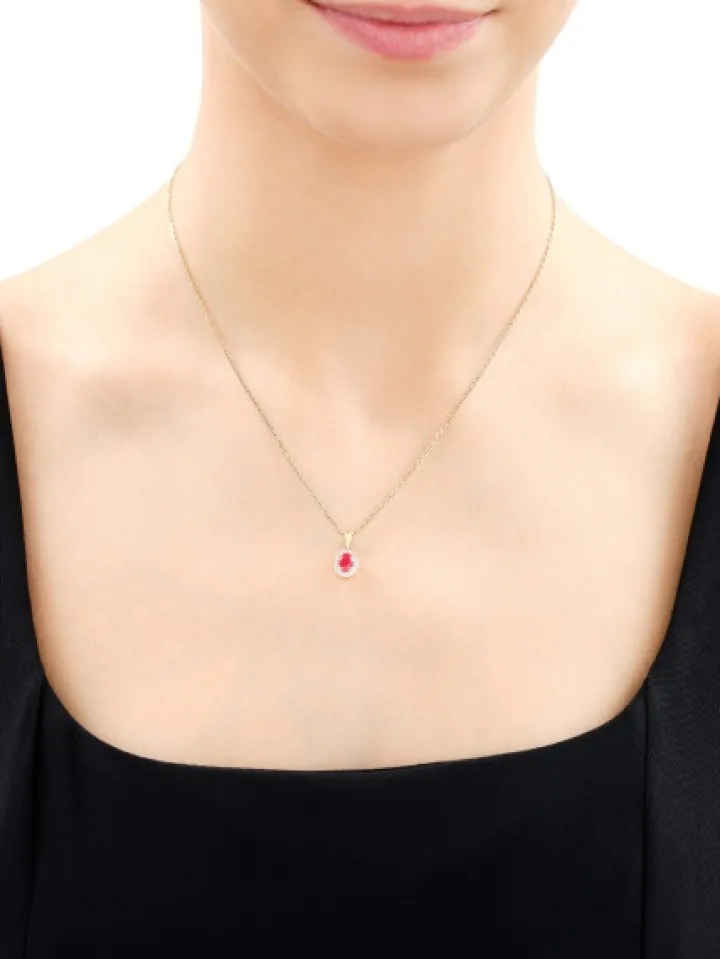 Zawieszka z żółtego złota z diamentami i rubinem - próba 585