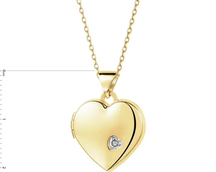 Zawieszka z żółtego złota z diamentem - puzderko - serce - 0,005 ct - próba 375