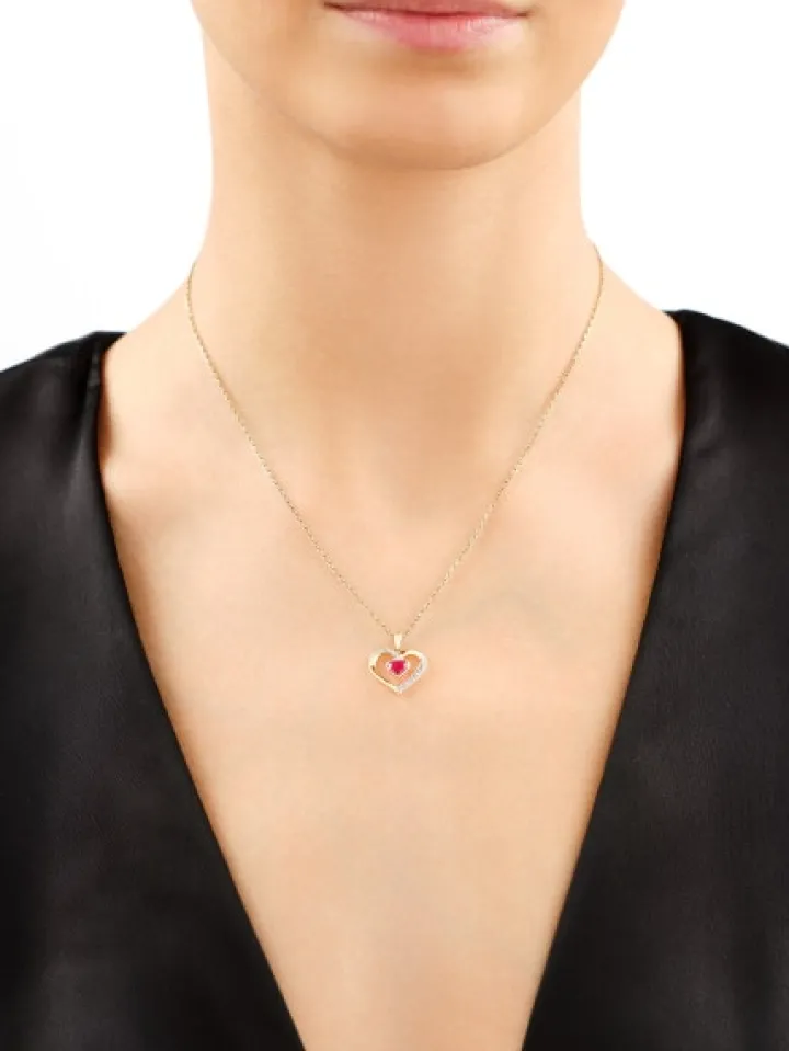 Zawieszka z żółtego złota z diamentami i rubinem syntetycznym - serce - próba 375