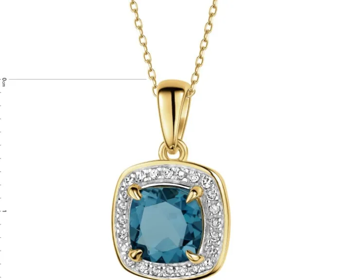 Zawieszka z żółtego złota z diamentami i topazem London Blue - próba 585