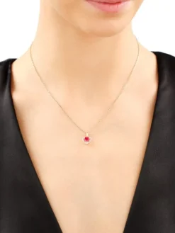 Zawieszka z żółtego złota z diamentami i rubinem syntetycznym - serce - próba 375