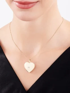 Zawieszka z żółtego złota z diamentem - puzderko - serce - 0,005 ct - próba 585