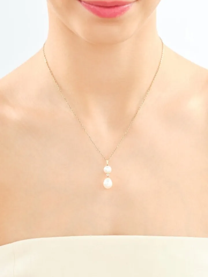 Zawieszka z żółtego złota z diamentami i perłami - próba 585