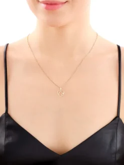 Zawieszka z żółtego złota z diamentem - litera G, serce - 0,005 ct - próba 375