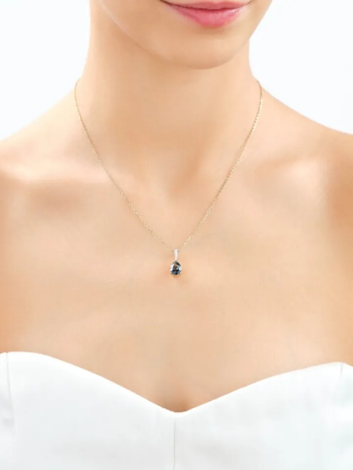 Zawieszka z żółtego złota z diamentami i topazem London Blue - próba 585