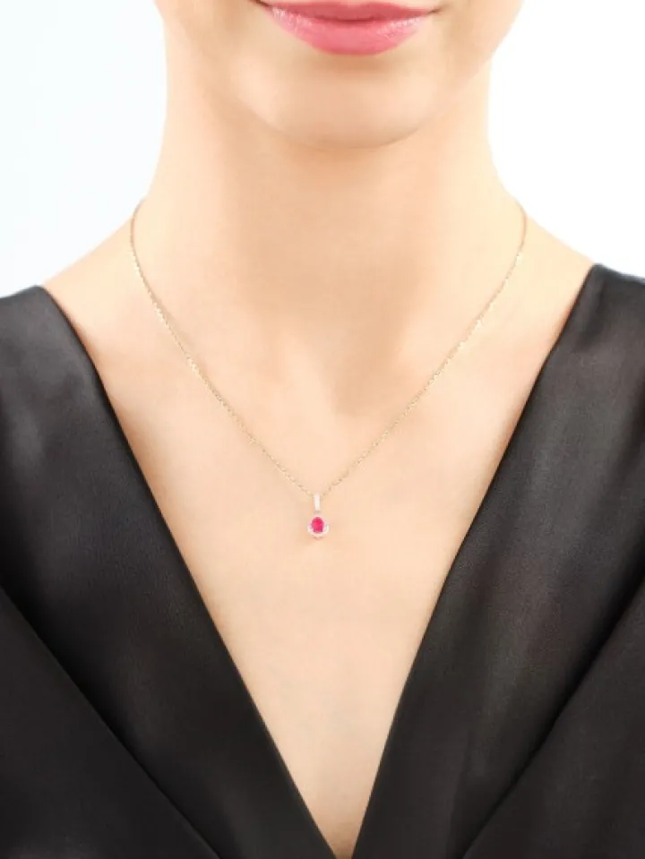 Zawieszka z żółtego złota z diamentami i rubinem - próba 585