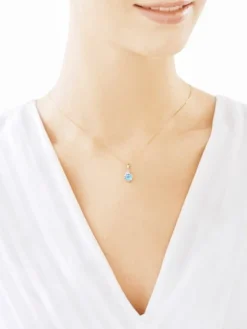 Zawieszka z żółtego złota z diamentami i topazem - próba 375