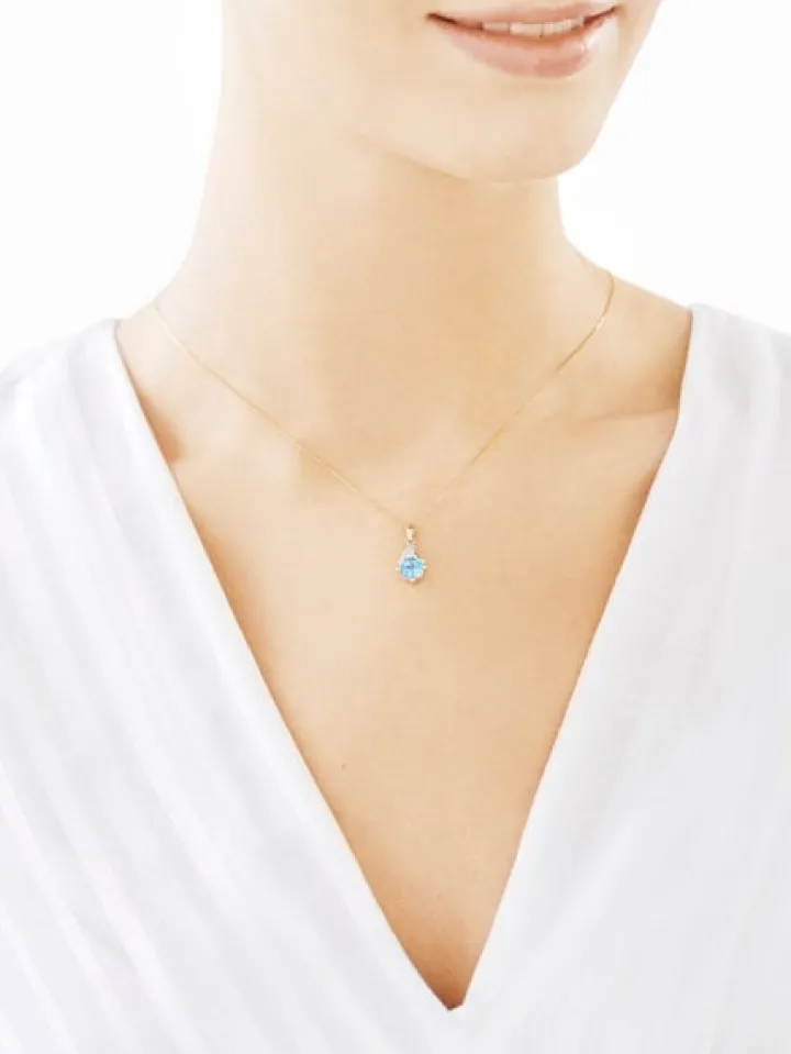 Zawieszka z żółtego złota z diamentami i topazem - próba 375