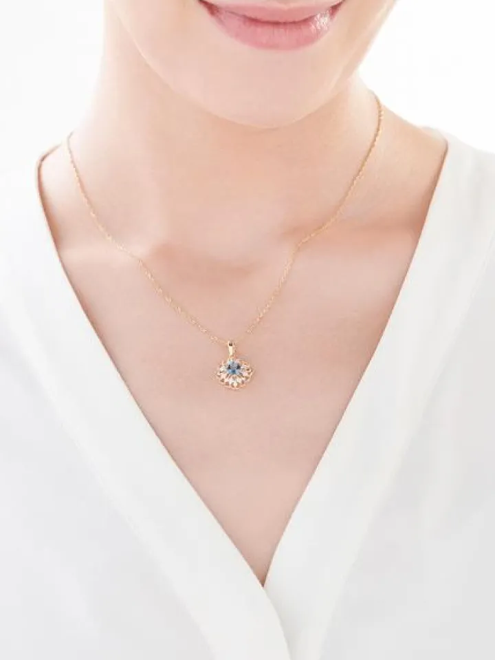 Zawieszka z żółtego złota z diamentami i topazem London Blue - próba 585