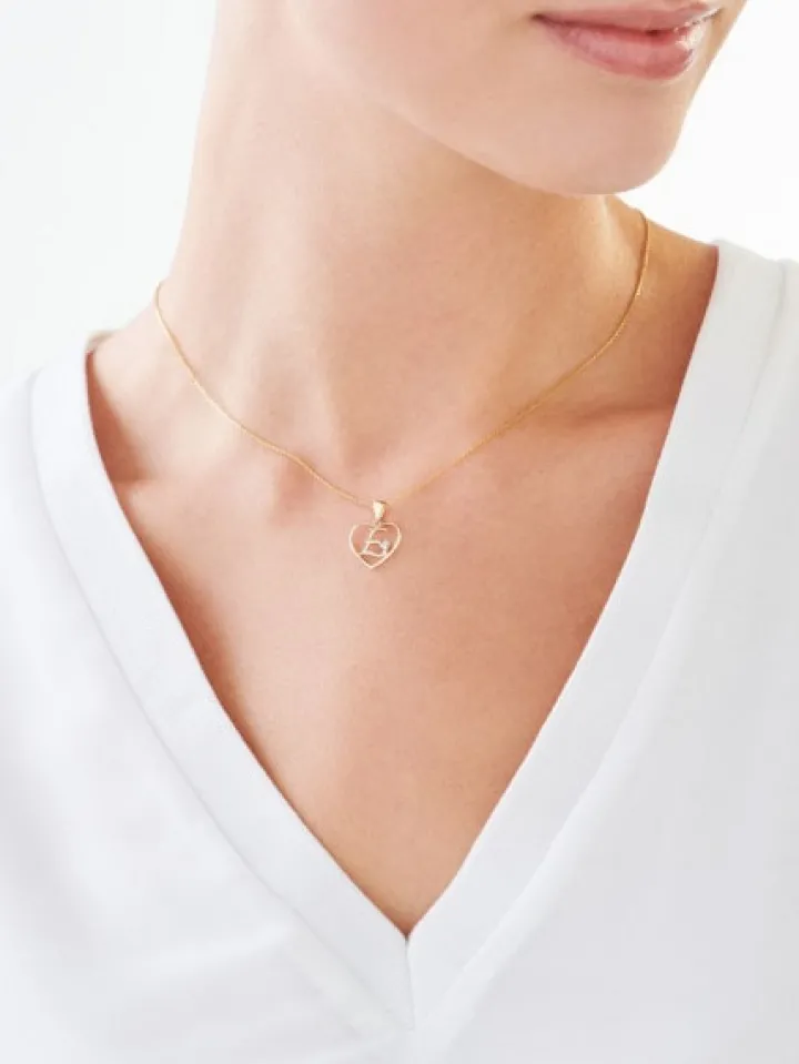Zawieszka z żółtego złota z diamentem - litera E, serce - 0,005 ct - próba 375