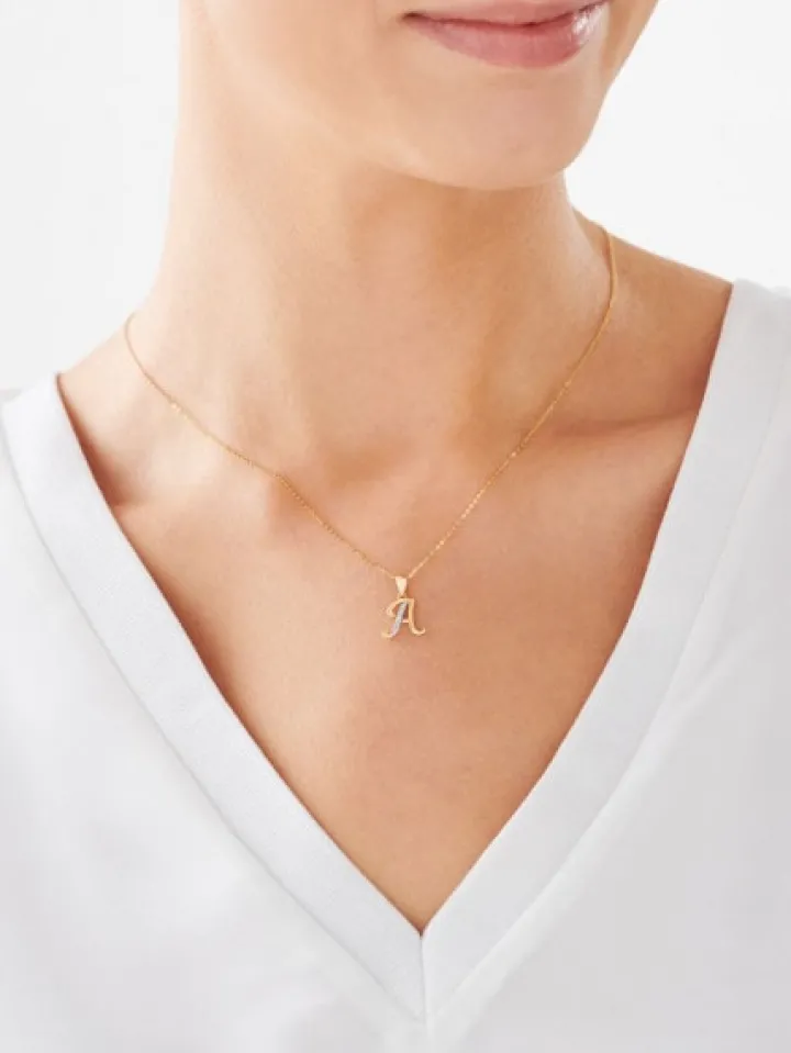 Zawieszka z żółtego złota z diamentem - litera A - 0,003 ct - próba 375