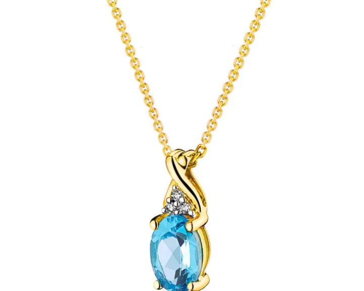 Zawieszka z żółtego złota z diamentami i topazem - próba 375
