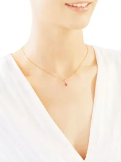 Zawieszka z żółtego złota z diamentami i rubinem - próba 375