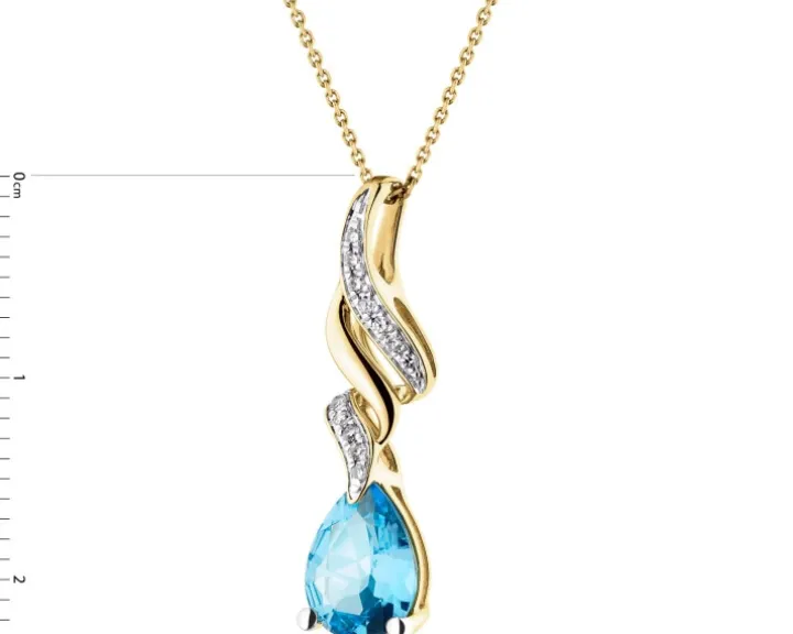 Zawieszka z żółtego złota z diamentami i topazem - próba 585