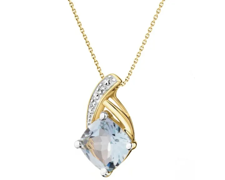 Zawieszka z żółtego złota z diamentami i topazem Sky Blue - próba 375