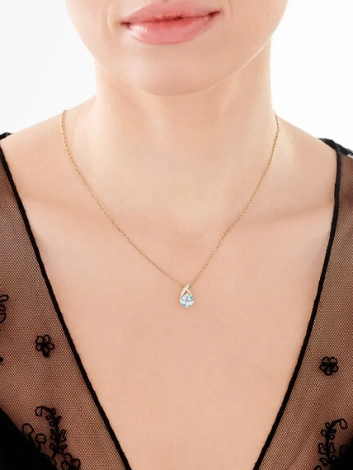 Zawieszka z żółtego złota z diamentami i topazem Sky Blue - próba 375