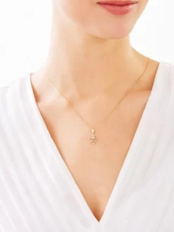 Zawieszka z żółtego złota z diamentem - aniołek, serce - 0,004 ct - próba 375