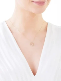 Zawieszka z żółtego złota z diamentami - serce, nieskończoność - 0,01 ct - próba 375