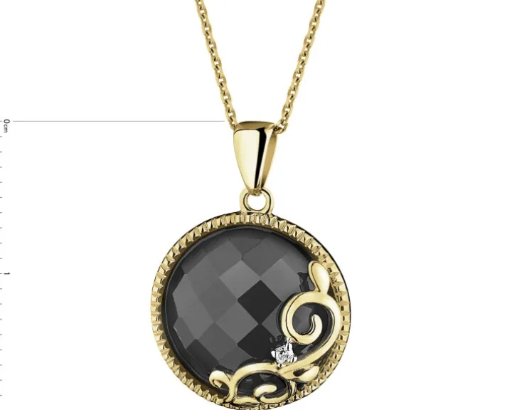 Zawieszka z żółtego złota z diamentem i onyksem - próba 585