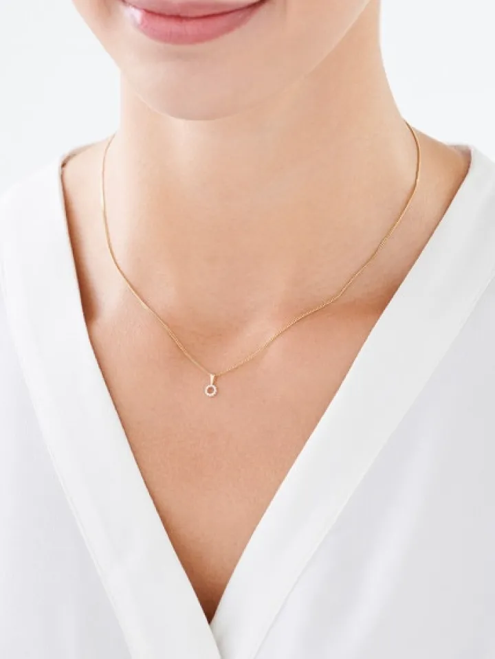 Zawieszka z żółtego złota z diamentami - koło - 0,02 ct - próba 375