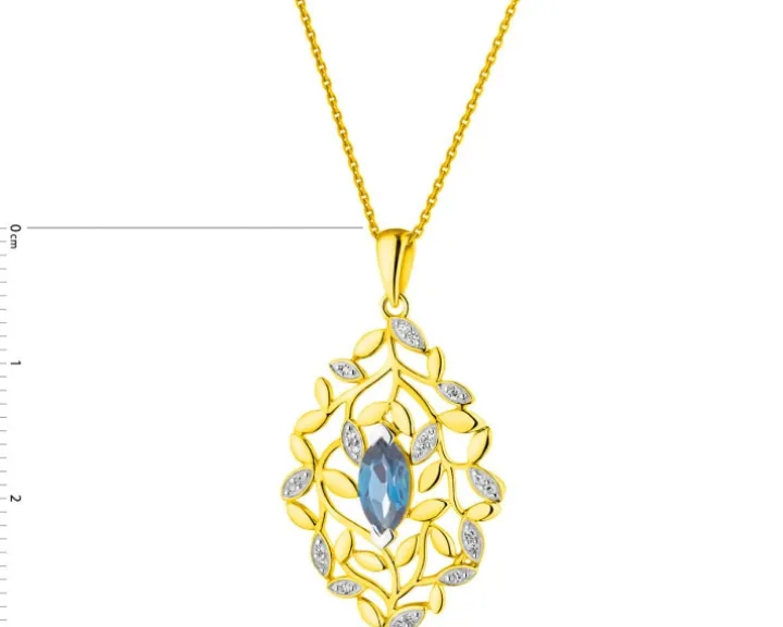 Zawieszka z żółtego złota z diamentami i topazem London Blue - próba 585