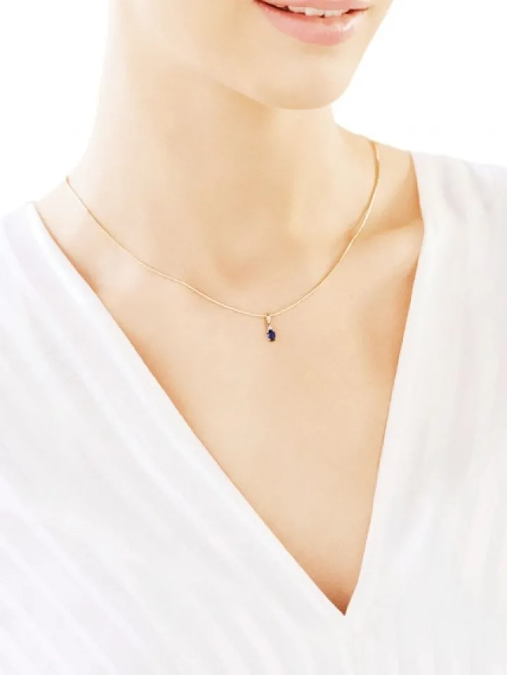 Zawieszka z żółtego złota z diamentami i szafirem - próba 375