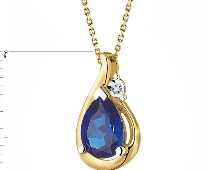 Zawieszka z żółtego złota z diamentem i szafirem syntetycznym - próba 375