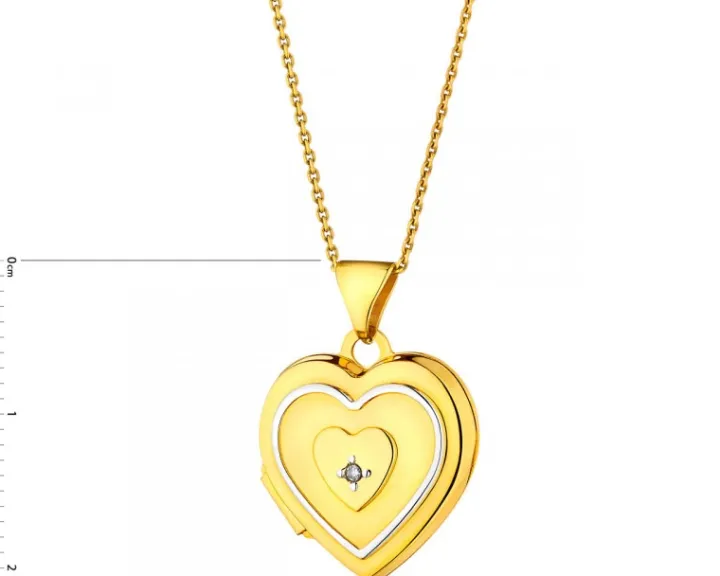Zawieszka z żółtego złota z diamentem - puzderko - serce - 0,004 ct - próba 585