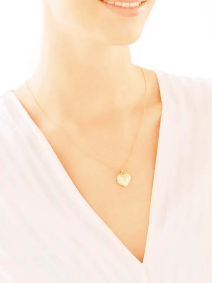 Zawieszka z żółtego złota z diamentem - puzderko - serce - 0,004 ct - próba 585