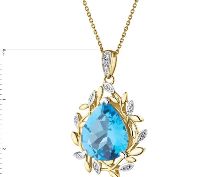 Zawieszka z żółtego złota z diamentami i topazem - próba 585