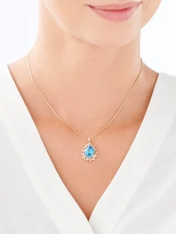 Zawieszka z żółtego złota z diamentami i topazem - próba 585