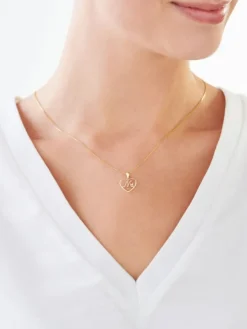 Zawieszka z żółtego złota z diamentem - litera M, serce - 0,005 ct - próba 375