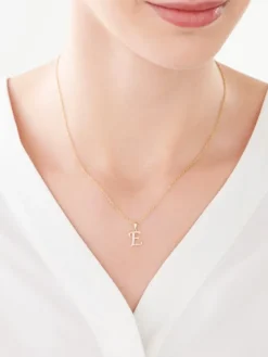 Zawieszka z żółtego złota z diamentem - litera E - 0,003 ct - próba 375