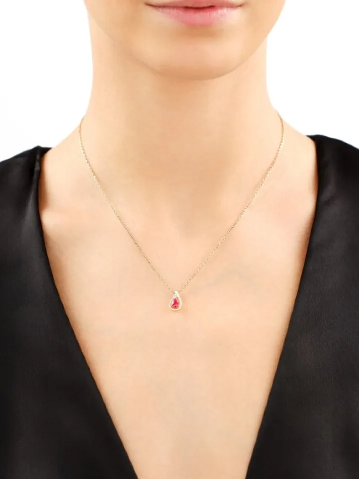 Zawieszka z żółtego złota z diamentem i rubinem - próba 585