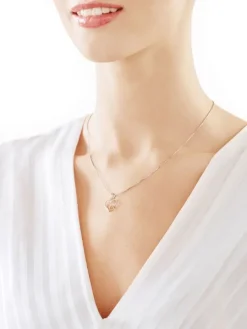 Zawieszka z żółtego złota z diamentami - serca - 0,01 ct - próba 375